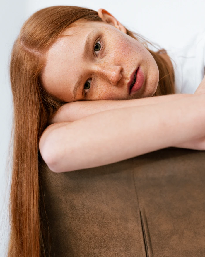Close-up portrait of a red-haired woman